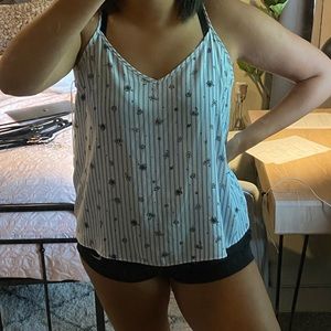 flowy blue striped top with black flowers